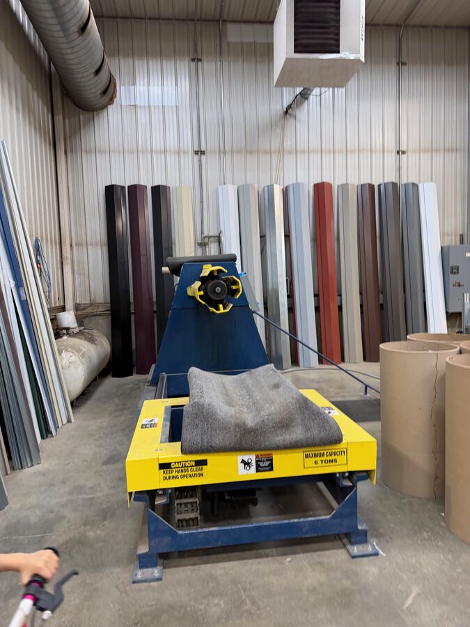 Decoiler feeding coil into the line — Valley Steel & Trim, Carpenter SD