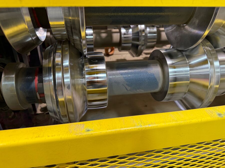 Forming rollers shape each rib of the panel — Valley Steel & Trim